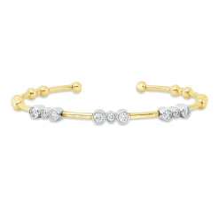 Armreif aus 585 Gold gelb/weiß 9 Diamanten 0,63ct TW-SI 58x48mm Zarge